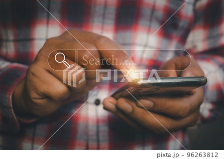Hand man using moblie phone for Searching browsing data on the Internet online.network,media, keyword Hand man using moblie phone for Searching browsing data on the Internet online.network,media, keyword 96263812