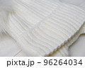 white knitted hat close-up. 96264034