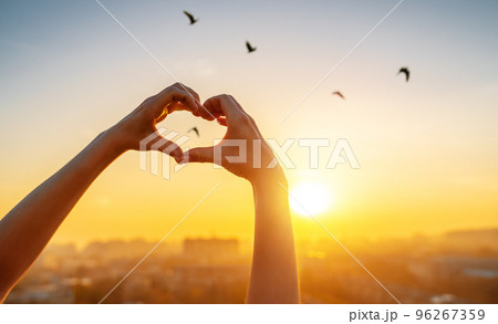 hands in the form of heart 96267359