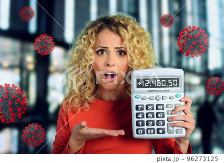 Shocked expression of a woman who is scared to increase of coronavirus contagion. 96273125