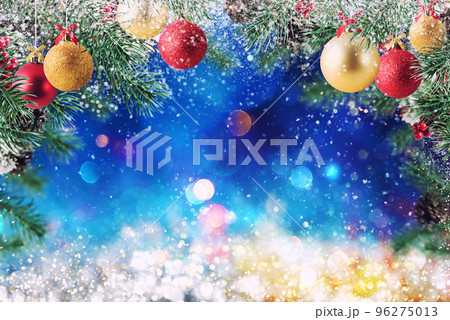 Christmas decoration with snow, pine and ball with sparkly background 96275013