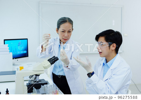 medical research laboratories, scientists analyze chemical samples Discuss technological innovations. Advanced scientific laboratories for medicine, biotechnology 96275588