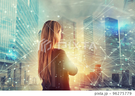 Businesswoman looks far for the future with internet network effect 96275779