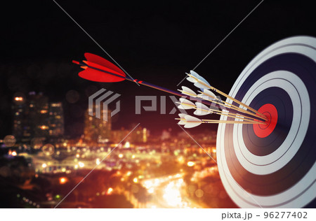 Arrow hit the center of target with modern skyline background. Business target achievement concept. 3D Rendering Arrow hit the center of target with modern skyline background. Business target achievement concept. 3D Rendering 96277402