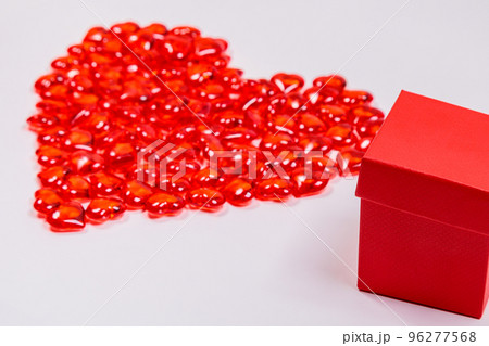 Gift box on the background of a big heart. The concept of congratulations, love. 96277568