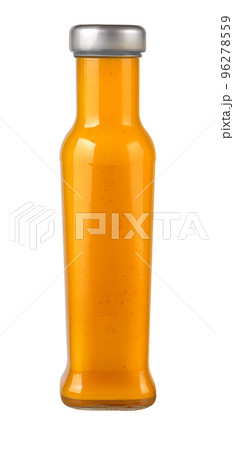 Mango sauce condiment in a glass jar bottle Mango sauce condiment in a glass jar bottle 96278559