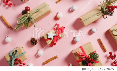Christmas presents on pink background Christmas presents on pink background 96279875