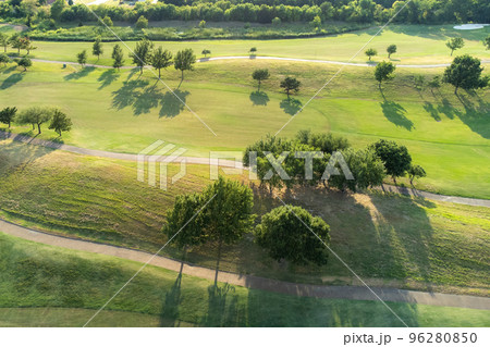 Top aerial view of beautiful park, green zone. Birds eye and drone photography of summer park. Nature landscape, green meadows in countryside in sunny day. Top aerial view of beautiful park, green zone. Birds eye and drone photography of summer park. Nature landscape, green meadows in countryside in sunny day. 96280850