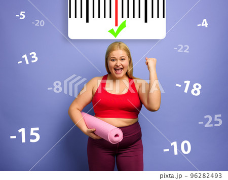 Fat girl does gym at home with satisfied expression because she decrease her weight. purple background 96282493