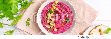 Beetroot hummus on white table, top view Beetroot hummus on white table, top view 96293065
