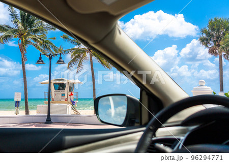 Seafront beach promenade with palm trees on background on sunny day in Fort Lauderdale in Florida USA, view from a car Seafront beach promenade with palm trees on background on sunny day in Fort Lauderdale in Florida USA, view from a car 96294771