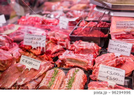 Meat department shelves with typical Italian raw meat inside grocery market in Italy Meat department shelves with typical Italian raw meat inside grocery market in Italy 96294996
