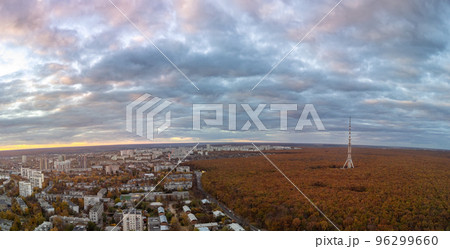 Aerial autumn sunset city view with telecom tower 96299660