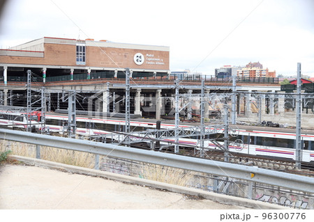 Train. Train tracks. Train entering a station. Subway leaving the station. Means of transport in Madrid, in Spain. Horizontal photography. Train. Train tracks. Train entering a station. Subway leaving the station. Means of transport in Madrid, in Spain. Horizontal photography. 96300776