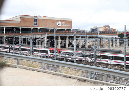 Train. Train tracks. Train entering a station. Subway leaving the station. Means of transport in Madrid, in Spain. Horizontal photography. Train. Train tracks. Train entering a station. Subway leaving the station. Means of transport in Madrid, in Spain. Horizontal photography. 96300777