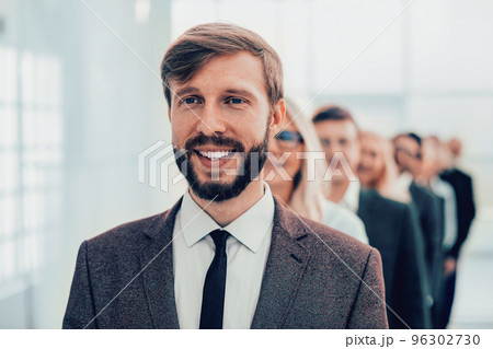 close up. group of happy employees standing in the office. close up. group of happy employees standing in the office. 96302730