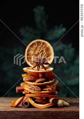 Christmas still-life with dried fruits and nuts. Christmas still-life with dried fruits and nuts. 96304556