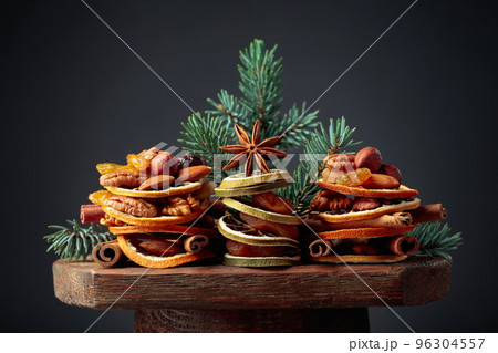 Christmas still-life with dried fruits and nuts. Christmas still-life with dried fruits and nuts. 96304557