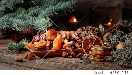 Christmas still-life with dried fruits and nuts. Christmas still-life with dried fruits and nuts. 96304558