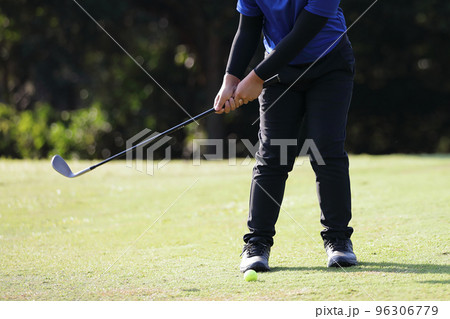 Young male golfer player on golf course 96306779
