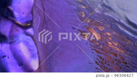 Purple gold paint. Flowing lilac color glitter paint texture. Fluid art painting abstract. Shine colorful vertical liquid flow. Luxury glamor golden background. Diagonal glow stripes pattern 96306827