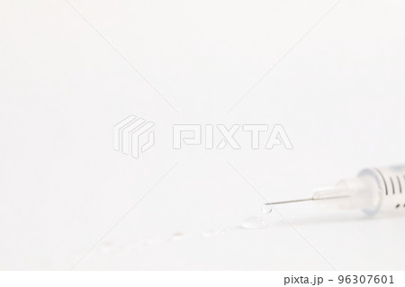 Syringe vaccine isolated in white background Syringe vaccine isolated in white background 96307601