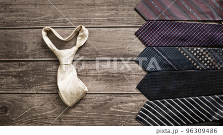 Neckties. Set different neckties. Colored tie for men. Set of stylish men accessories, men's fashion. Collection of coiled neckties in display. Bow tie. Neckties. Set different neckties. Colored tie for men. Set of stylish men accessories, men's fashion. Collection of coiled neckties in display. Bow tie. 96309486