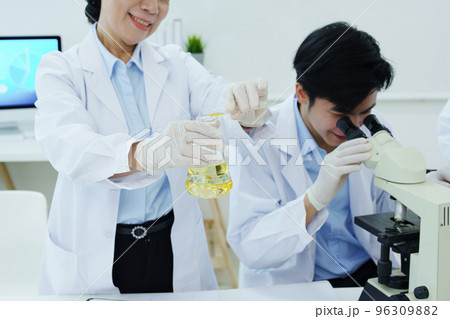 medical research laboratories, scientists analyze chemical samples Discuss technological innovations. Advanced scientific laboratories for medicine, biotechnology medical research laboratories, scientists analyze chemical samples Discuss technological innovations. Advanced scientific laboratories for medicine, biotechnology 96309882
