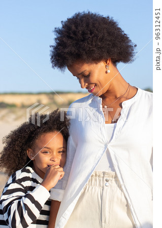 Fond mother and daughter on vacation Fond mother and daughter on vacation 96312451