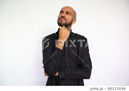 Portrait of pensive young man thinking or planning Portrait of pensive young man thinking or planning 96313046