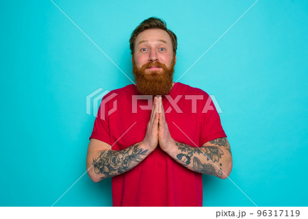 Man with beard asks to be forgiven and prays 96317119