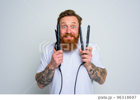 Wondered man hair straightener is ready to work Wondered man hair straightener is ready to work 96318697