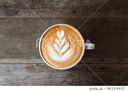 Latte art coffee with heart tree shape in coffee cup Latte art coffee with heart tree shape in coffee cup 96319435