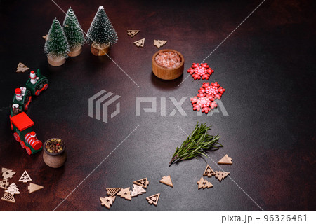 Fresh piece of raw pork with spices, salt and herbs on a wooden cutting board 96326481