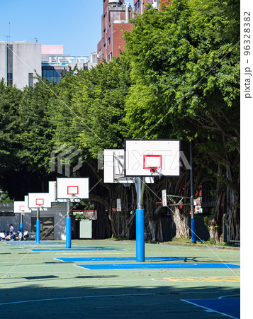 Outdoor basketball court in school. 96328382