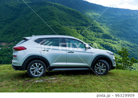 Silver car on the background of mountains 96329909