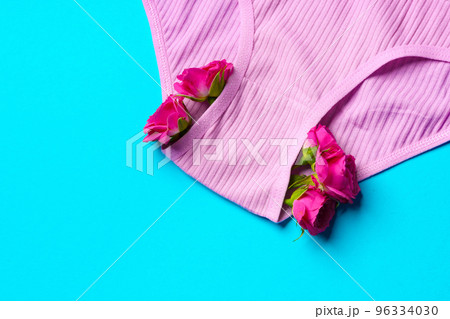 Women's panties with flower buds on paper background Women's panties with flower buds on paper background 96334030