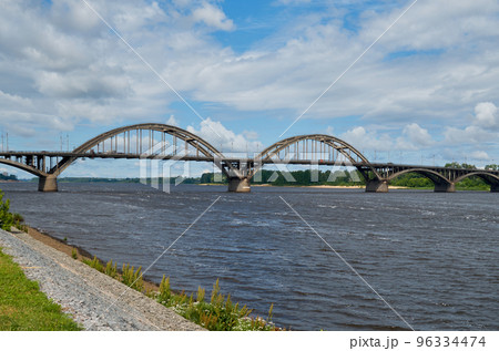 City bridge across the river with metal arches City bridge across the river with metal arches 96334474