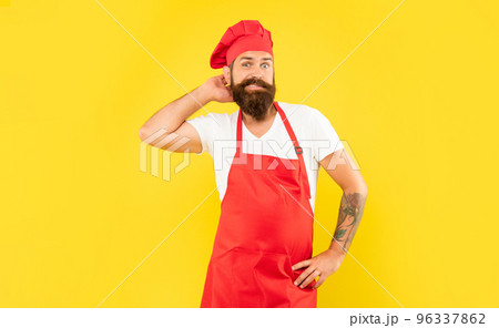 Hesitant man in red toque and apron scratching head yellow background, cook Hesitant man in red toque and apron scratching head yellow background, cook 96337862