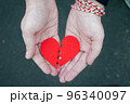 Divorce concept - Broken heart in the male hands. 96340097