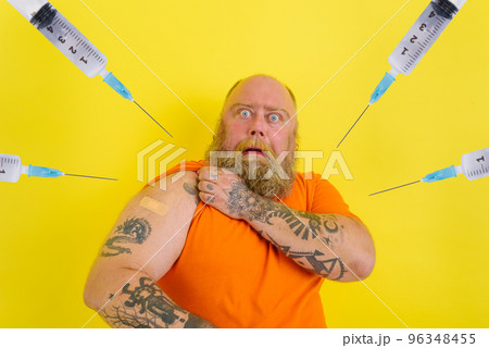Afraid man is afraid of getting the covid-19 vaccine 96348455