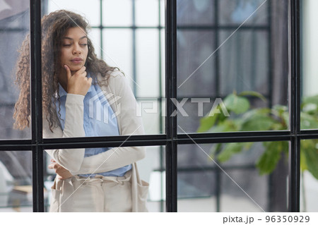 Business woman in the office outside the window 96350929