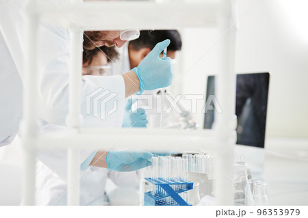 background image a scientist is conducting research in a laborat 96353979