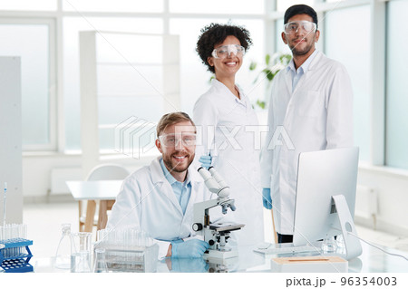 group of employees of a scientific medical laboratory at the workplace . 96354003