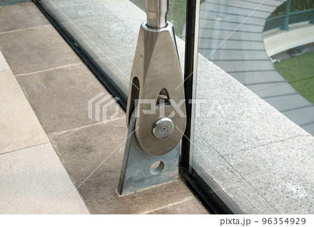 Stainless steel a big snap hook on cable. Detail of rope end.     96354929