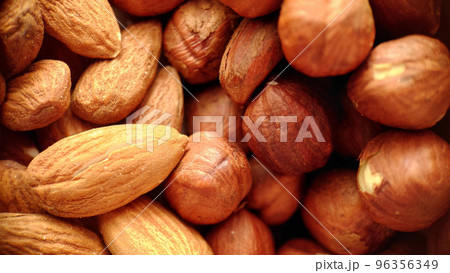 A mixture of almonds and hazelnuts in close-up 96356349
