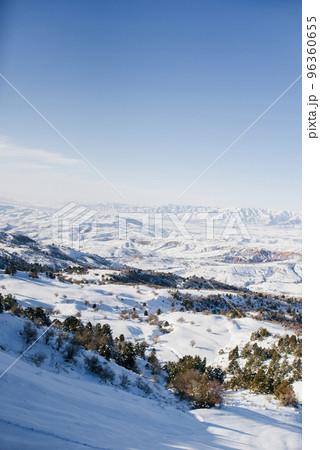 Location of the Tian Shan mountains, Uzbekistan, Central Asia. Captivating winter Wallpaper. The concept of the Christmas holidays. Happy New Year! Beauty of the earth. 96360655