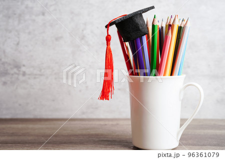 Colorful pencils in glass jar with copy space, learning university education concept. 96361079