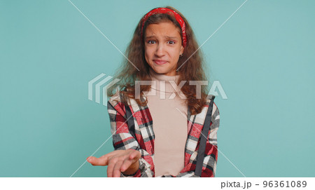 Teenager child girl kid asking why, what reason of failure, demonstrating disbelief by troubles Teenager child girl kid asking why, what reason of failure, demonstrating disbelief by troubles 96361089