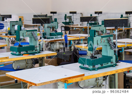 There are many industrial sewing machines in the workshop. They Can Sew Plastic Fabric, I.e. HDPE . PP. There are many industrial sewing machines in the workshop. They Can Sew Plastic Fabric, I.e. HDPE . PP. 96362484
